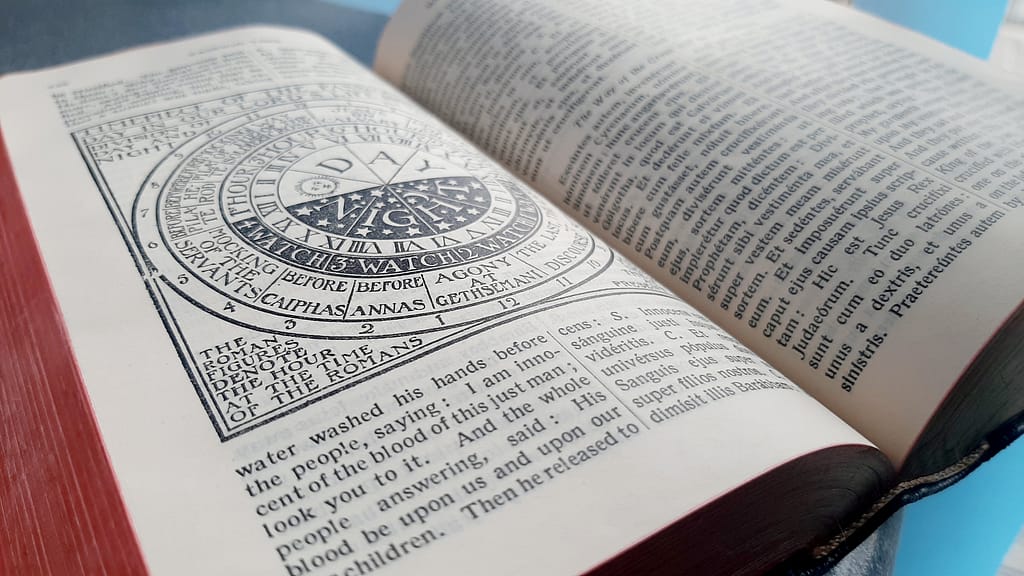 open page of St Andrews Daily Missal needing book repair and replacement ribbons