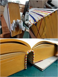 Roman Missal open showing 3 colour hand sewn silk end band