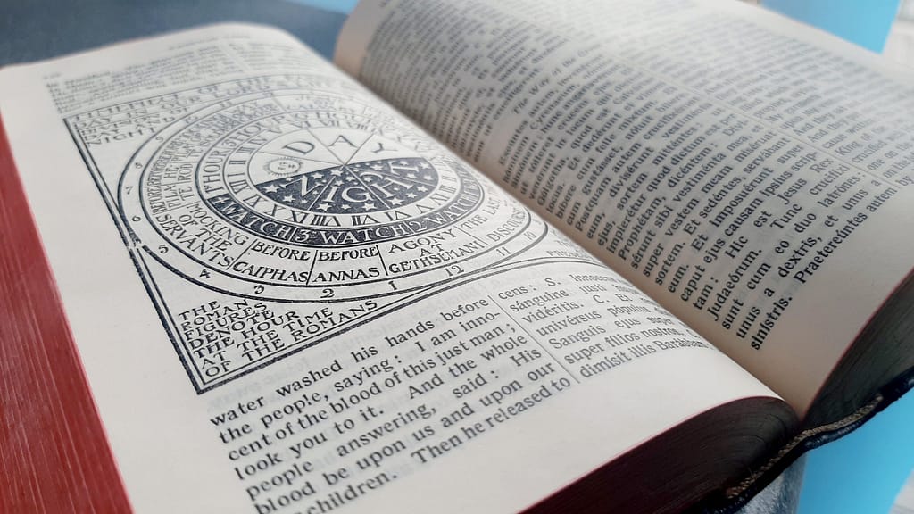 open page of St Andrews Daily Missal needing book repair and replacement ribbons