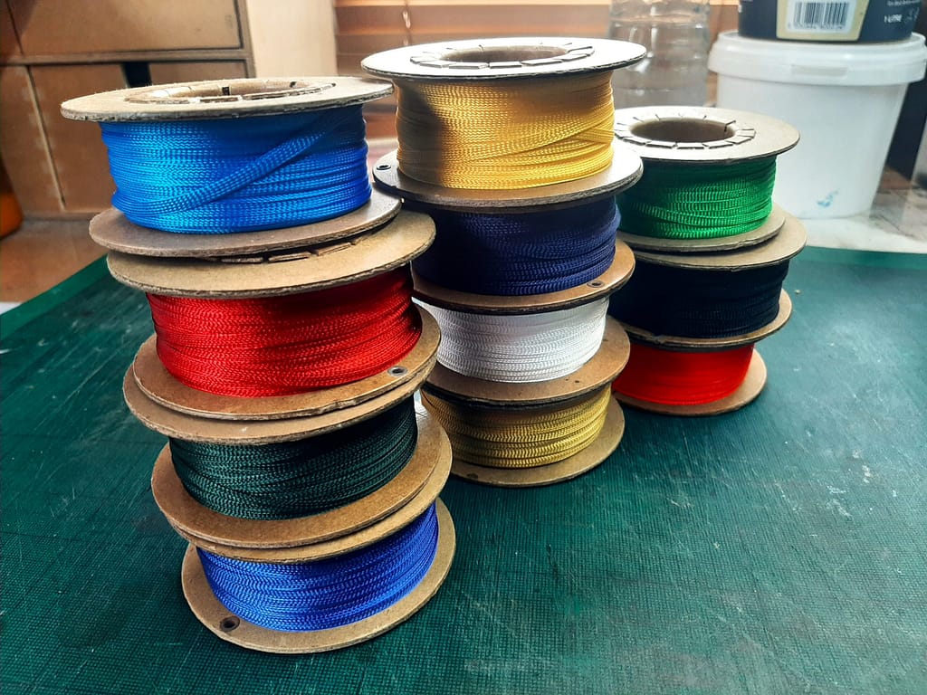 11 reels of woven book mark ribbons